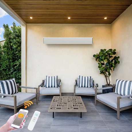 Modern outdoor patio with striped cushioned chairs, wall-mounted heater, and smart controls