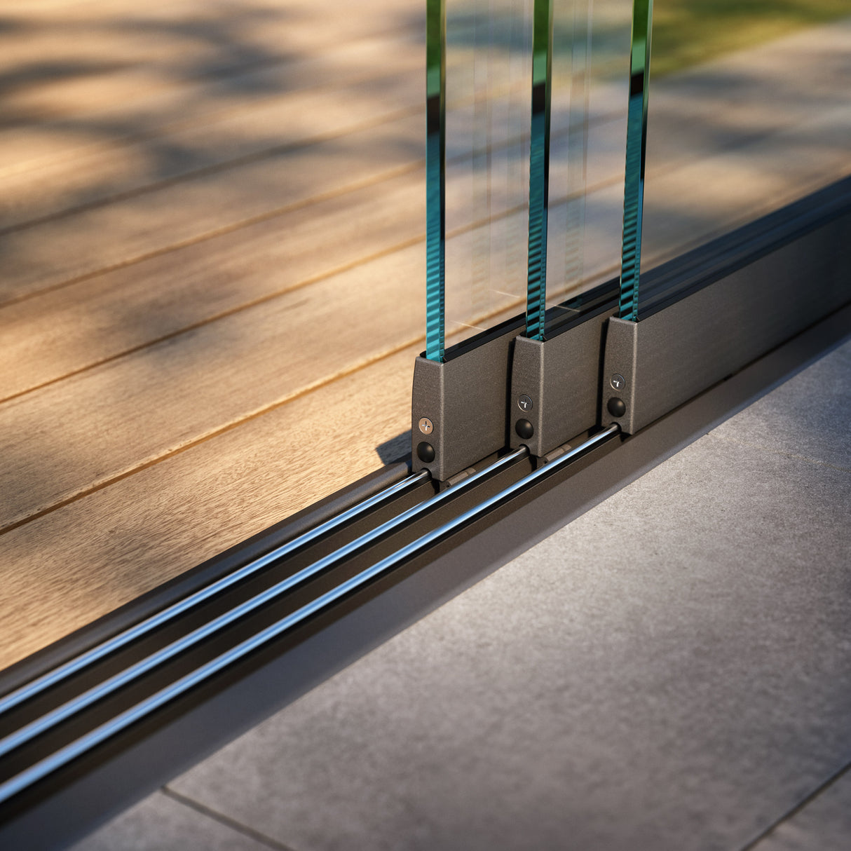 modern sliding glass door track system on outdoor patio with wood and stone flooring