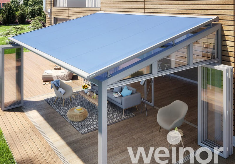 Modern blue pergola with cozy outdoor seating and glass walls for garden living